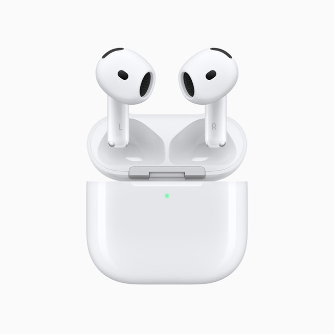 Apple AirPods 4 with Active Noise Cancellation hovering above wireless charging case — official Apple image