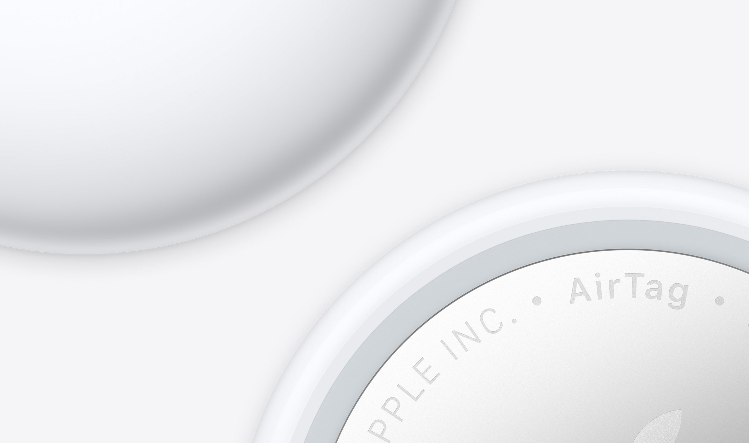 Apple AirTag 2nd generation — front and back detail