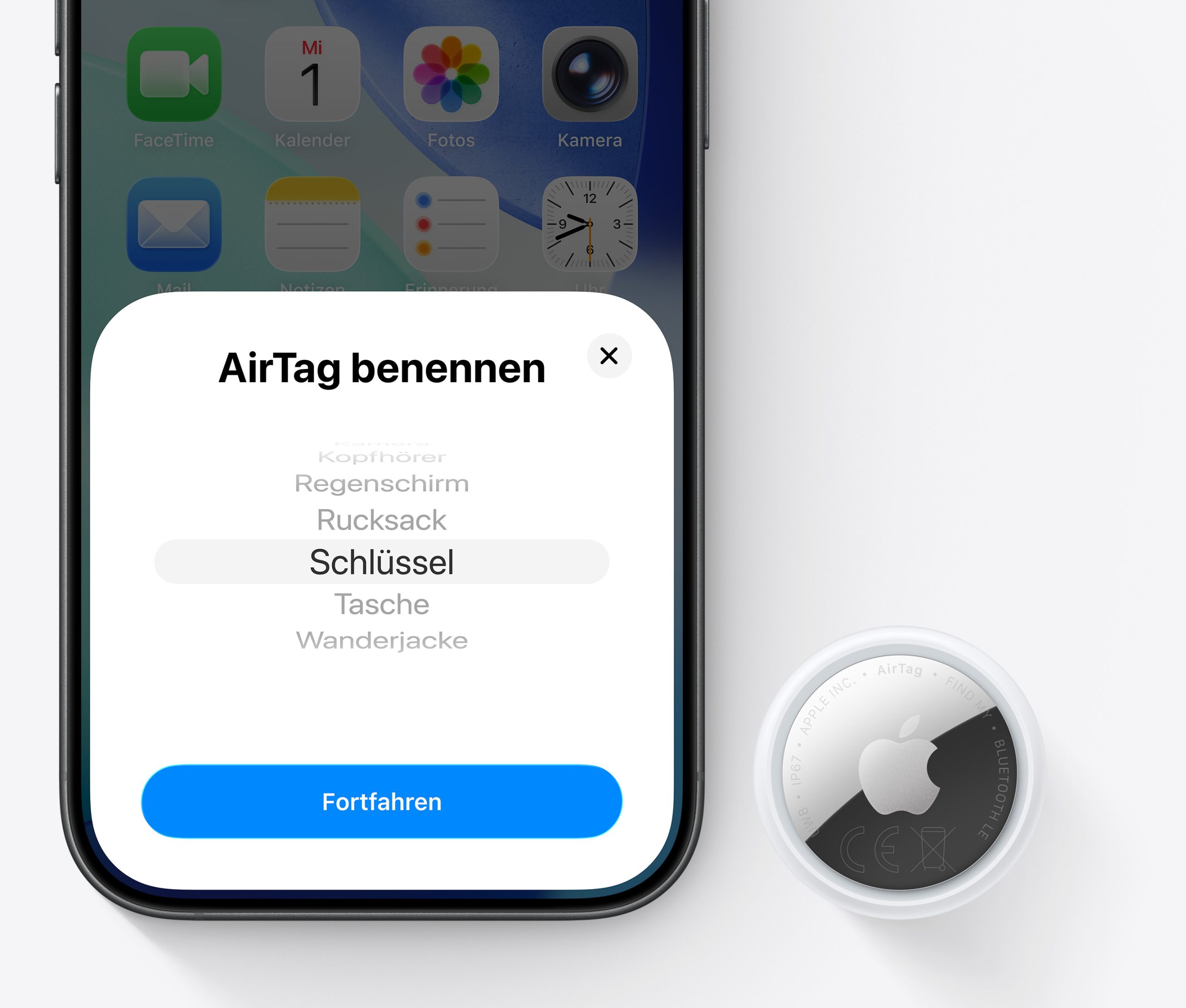 Apple AirTag 2nd generation — setup shown on iPhone, sold separately