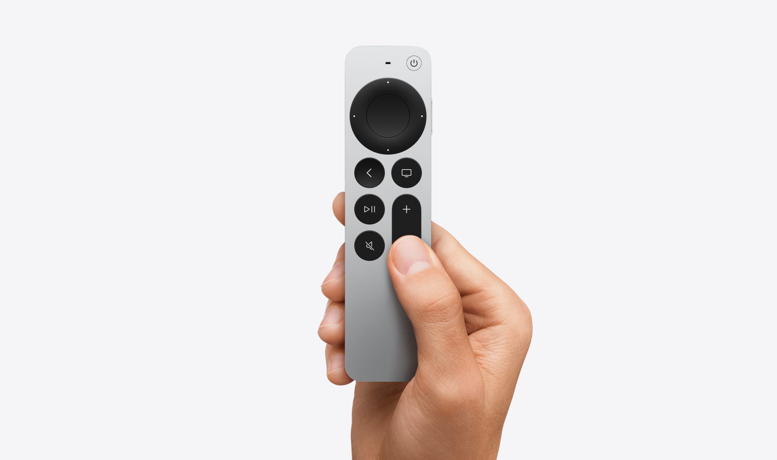 Apple TV 4K — Siri Remote held in hand