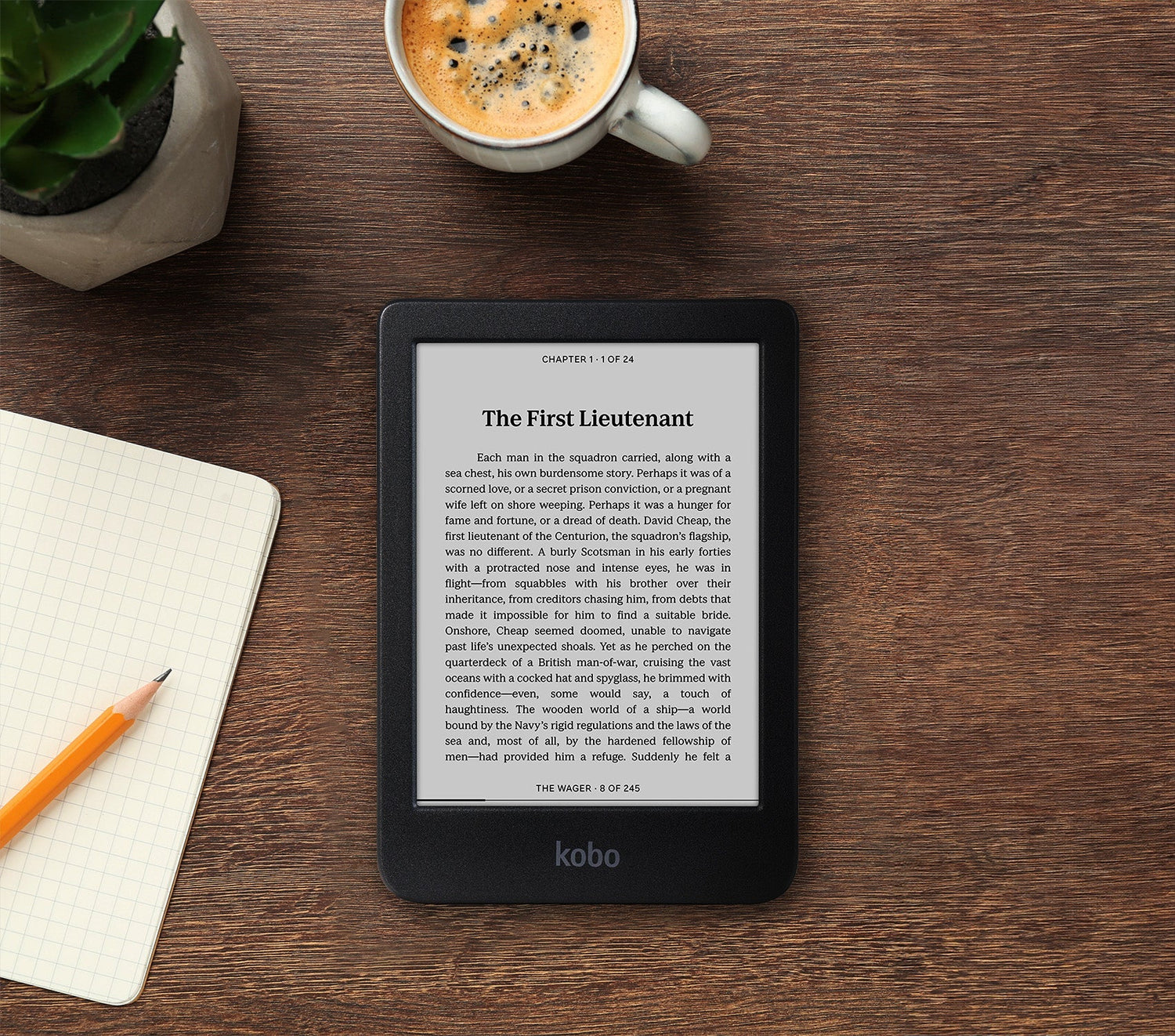 Kobo Clara BW eReader (Black, 16GB) — reading on a desk