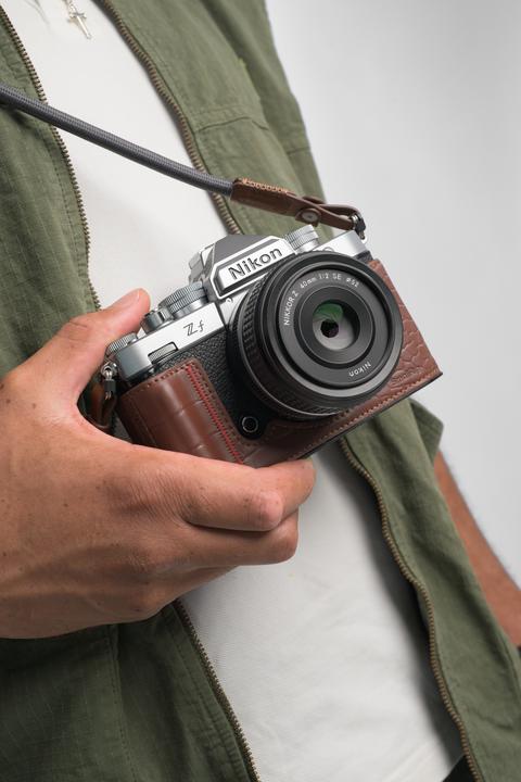 Nikon Zf Mirrorless Camera (Silver, Body Only) — Silver body in use; optional lens not included