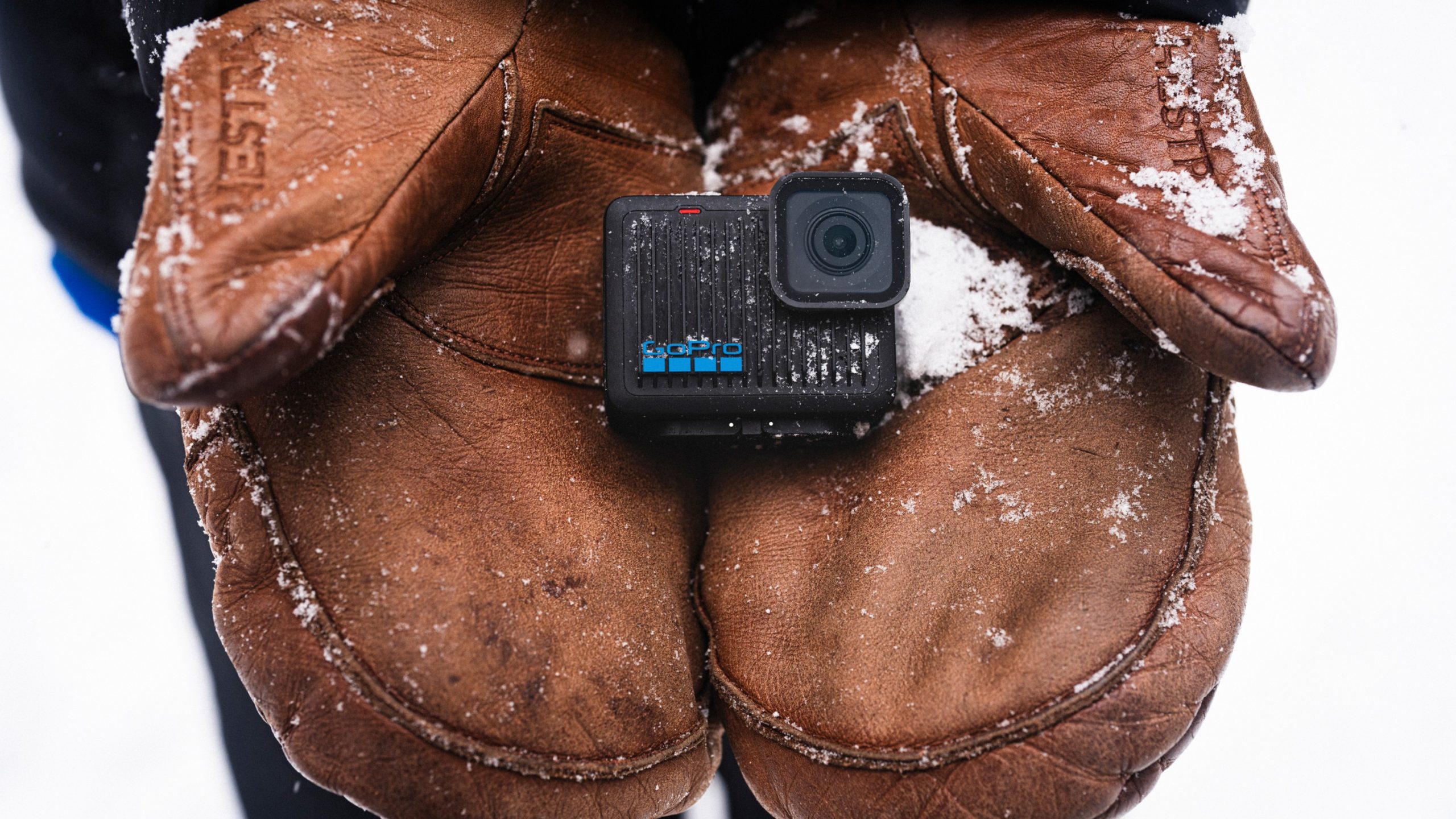 GoPro HERO 4K Action Camera (2024, Black) — Camera used with optional mounting accessory