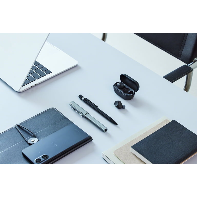 Sony WF-C710N Black earbuds and charging case on a desk