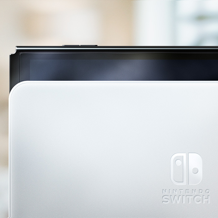 Close-up of the white Nintendo Switch OLED dock and console