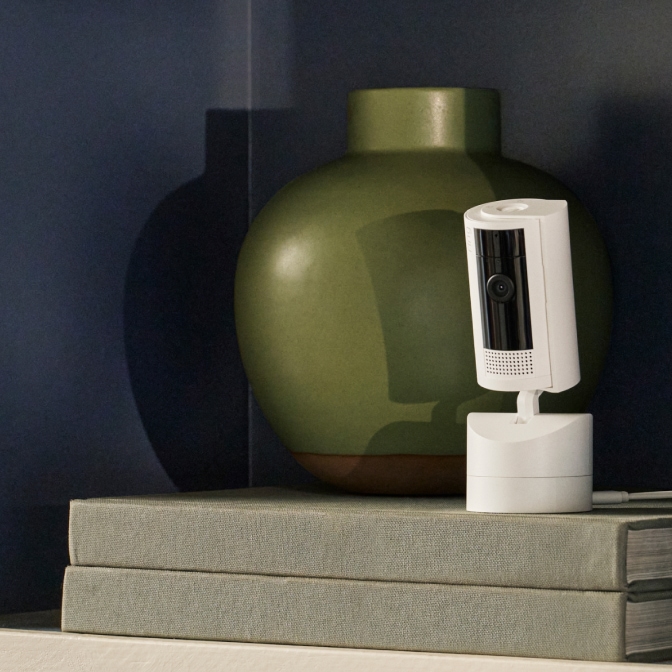 Ring Pan-Tilt Indoor Camera (White) — Camera on a shelf