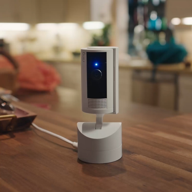 Ring Pan-Tilt Indoor Camera (White) — Manual privacy cover demonstration