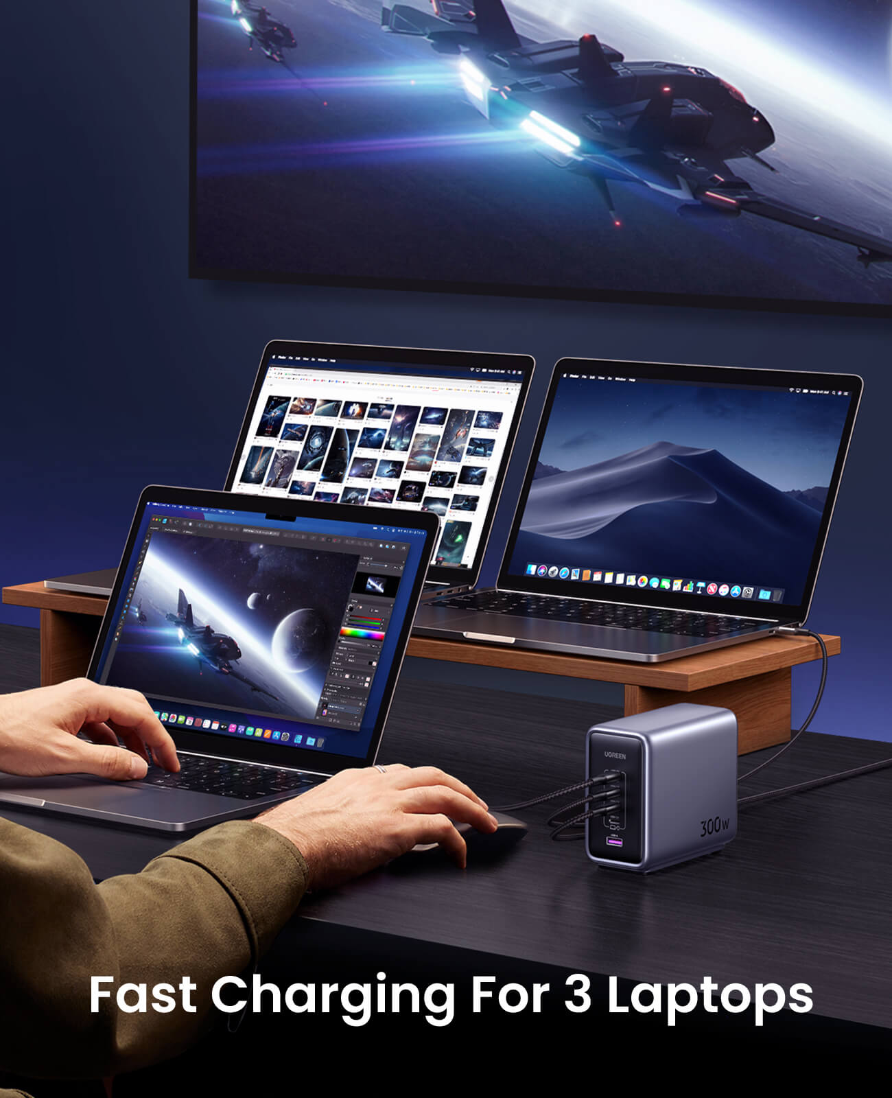 UGREEN Nexode 300W GaN charger shown charging five devices