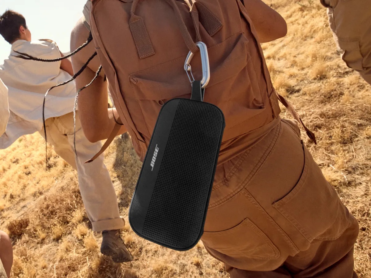 Bose SoundLink Flex Portable Speaker (2nd Gen, Black) — Speaker attached to a backpack