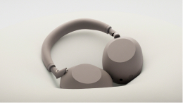 Sony WH-1000XM6 Wireless Noise Cancelling Headphones (Sandstone) — Folded headphones resting on a surface
